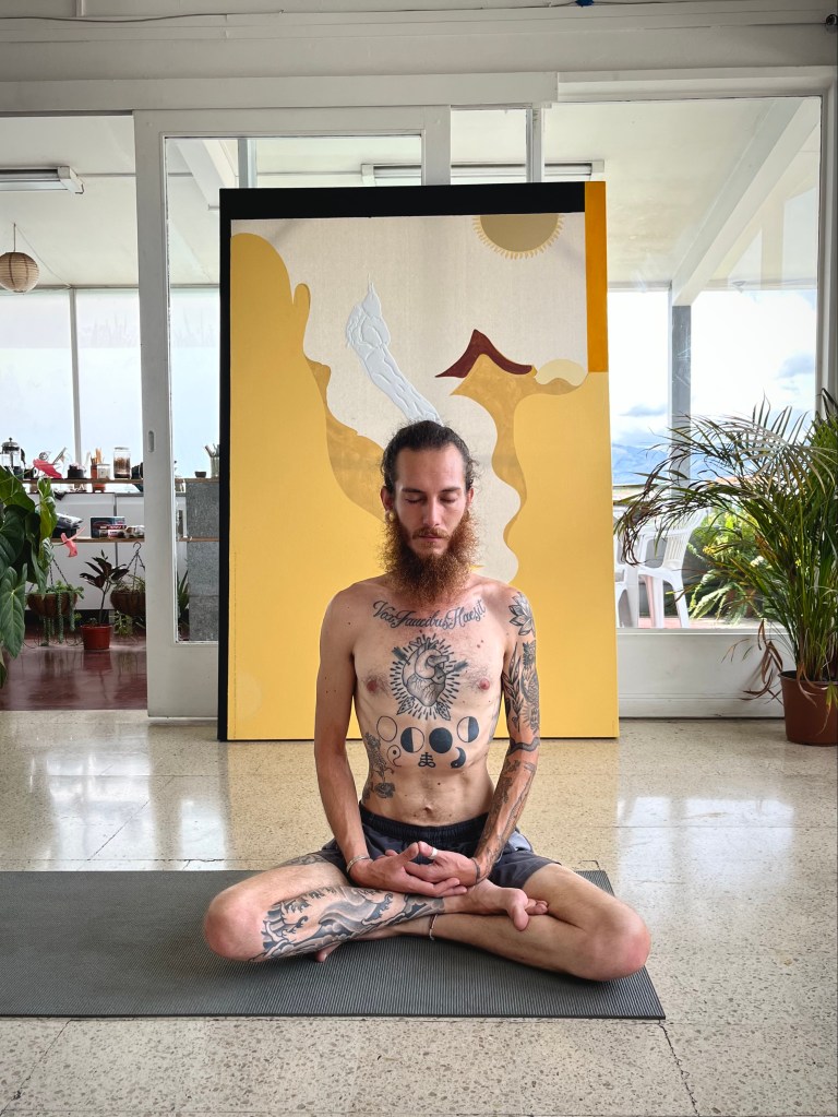 Dadou (Daruma yoga) practicing yoga