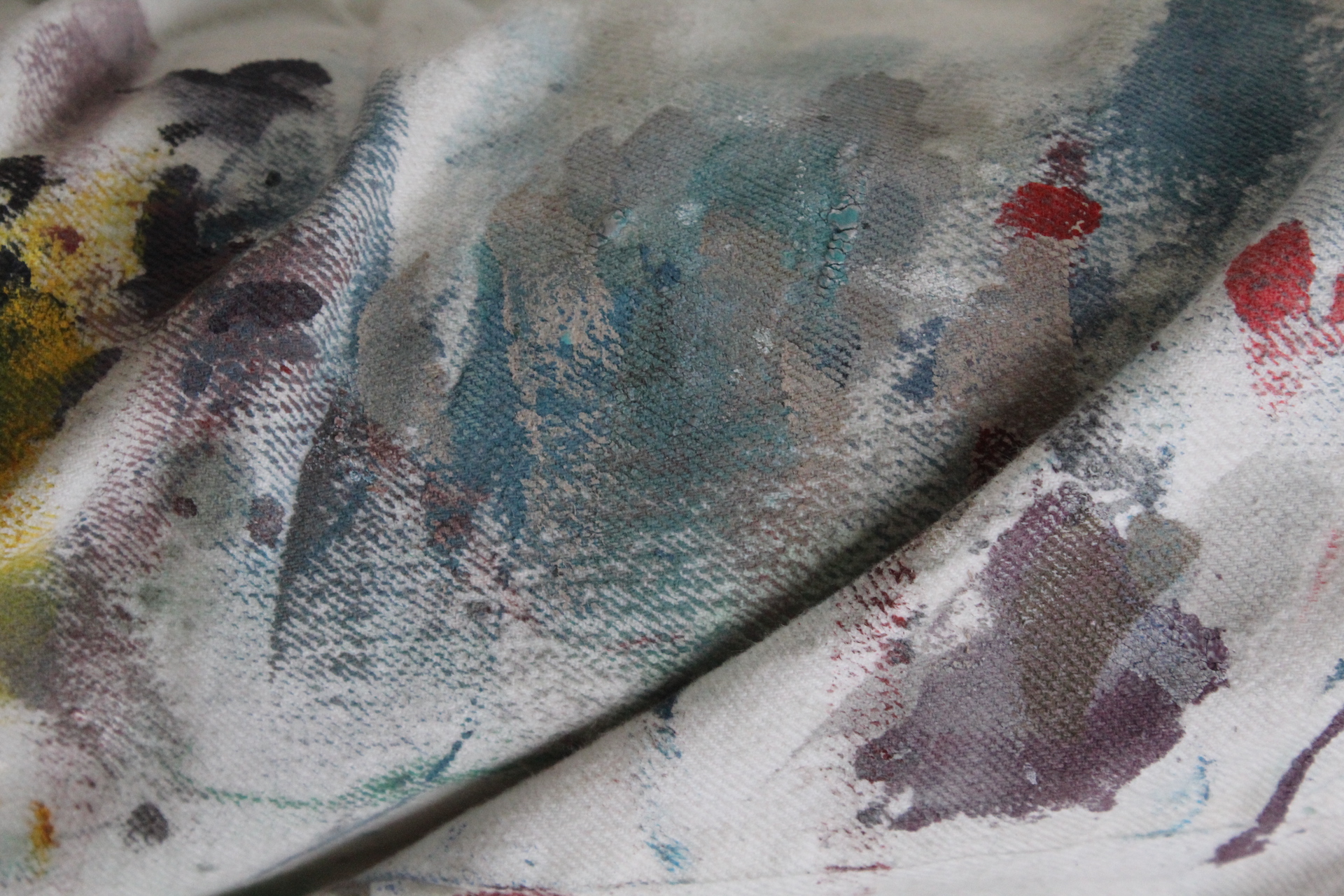 Fabian Monge painting in his workshop