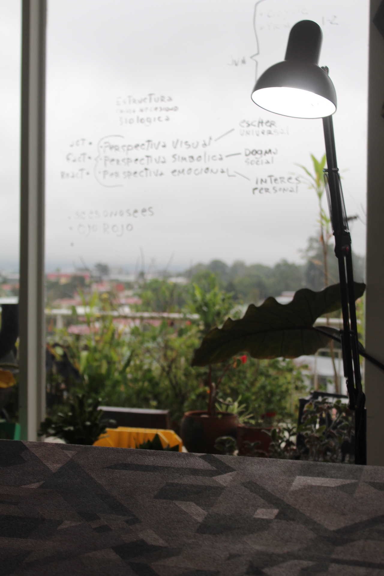 Fabian Monge painting in his workshop